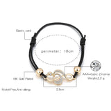 CZ Studded Treble Clef on Contrasting Black Rope Bracelet